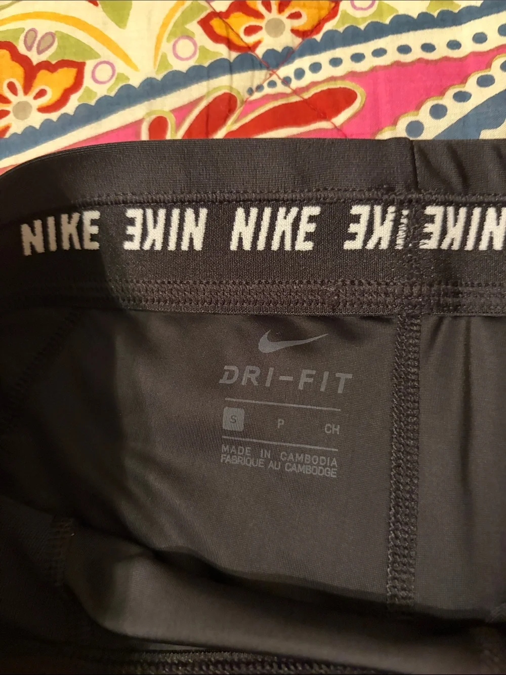 Women’s Nike Black Leggings with White Swoosh Logo